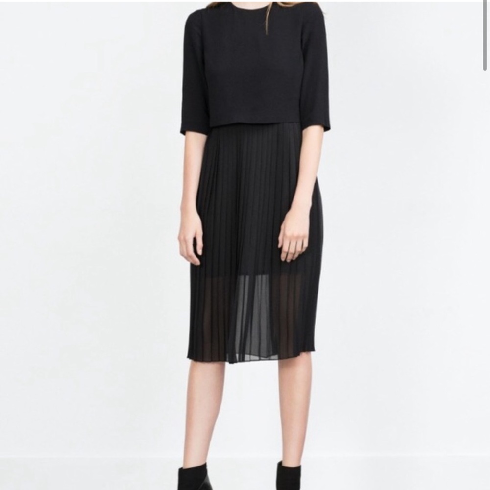 Zara Black dress with pleats.